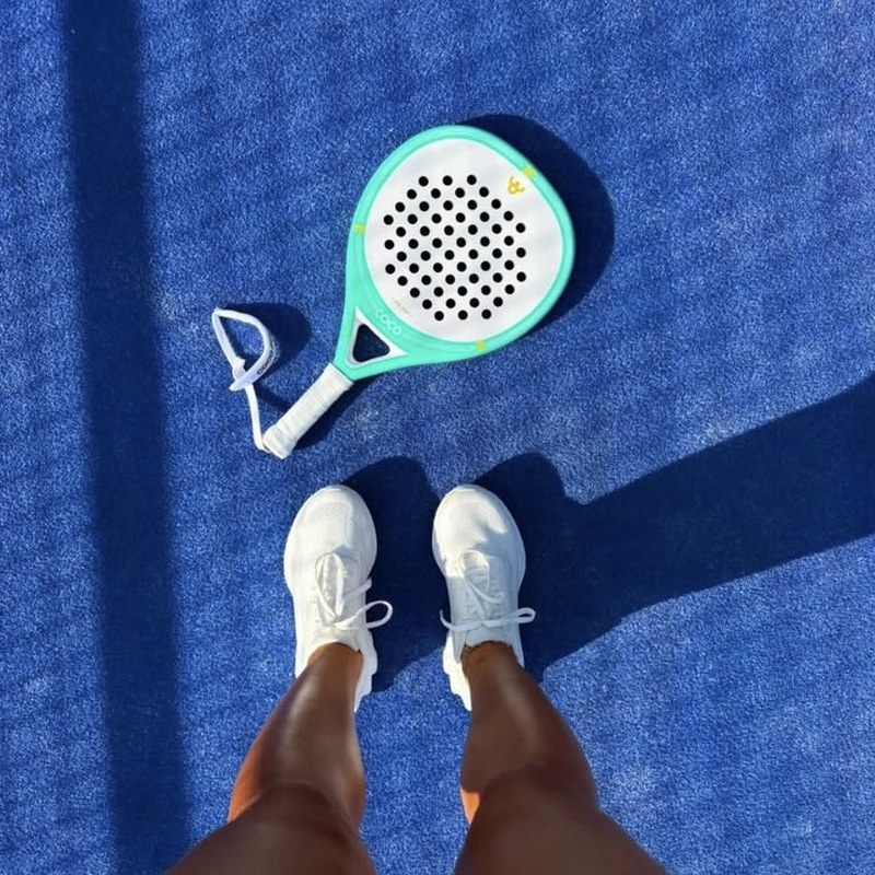 COCO Racquet Crew player on court with a COCO padel racket